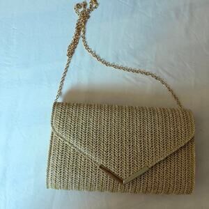 Woven clutch with gold color